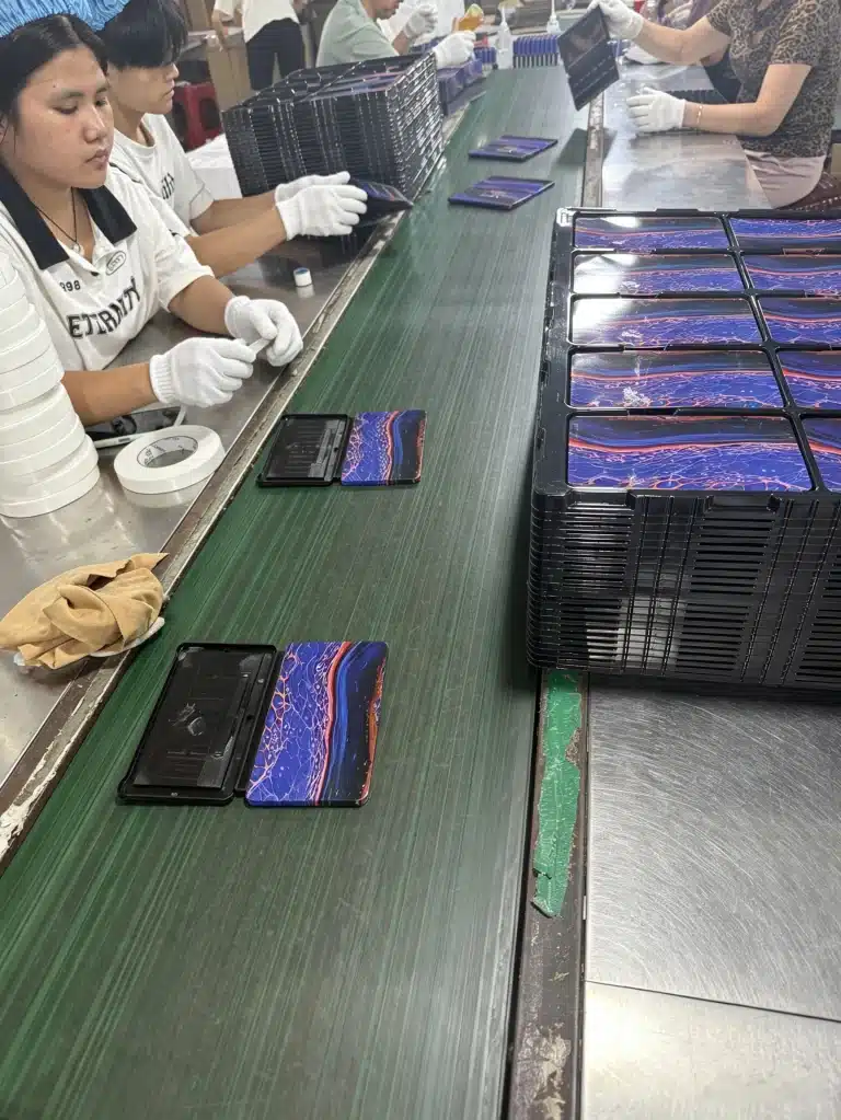 ADIFA palette tins on the assembly line